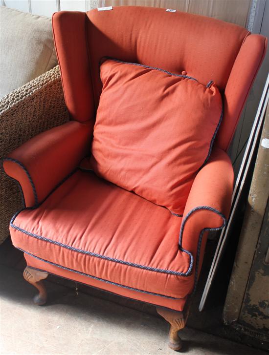 Pink fabric wing back chair